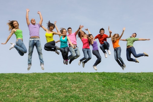 Teenagers jumping happily